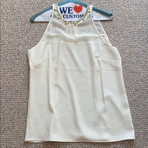 White blouse with jeweled neckline